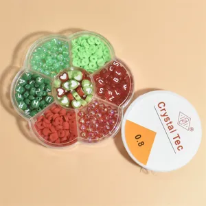 Detail view of DIY Christmas bead set with 0.8mm crystal thread and colorful polymer clay beads