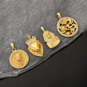Detail of hip hop 18k gold plated lion, pharaoh and dragon pendants with crystals.