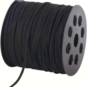Close-up detail of 3mm black faux suede cord wound on a black spool for DIY crafts