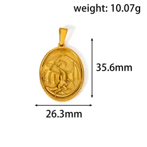 Macro detail of gold dragon relief pendant showing 35.6mm x 26.3mm dimensions