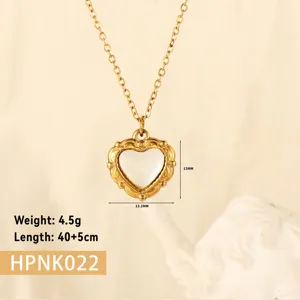Close-up of golden stainless steel heart pendant necklace with dimensions and weight data