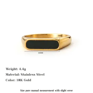Close-up detail view of 18K gold plated stainless steel ring with black rectangular inlay