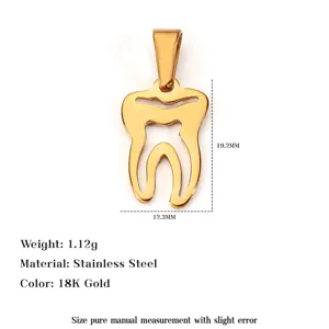 Detailed macro view of 18K gold-plated stainless steel tooth pendant with dimensions