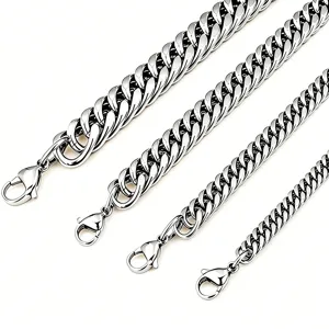 Detail view showing four different widths of polished stainless steel Cuban link chains for men.