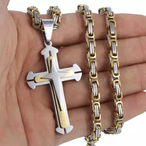Detailed view of two-tone gold and silver titanium steel cross pendant necklace