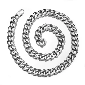 Detailed macro view of a heavy polished stainless steel Cuban link necklace spiral