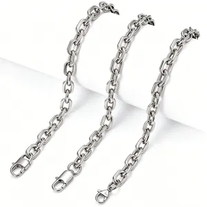 Close-up detail of three silver stainless steel paperclip chain necklaces with lobster clasps