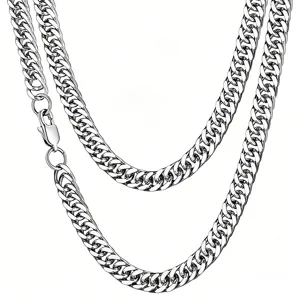 Detail of a heavy silver stainless steel Cuban link chain necklace with lobster clasp.