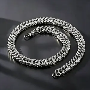 Close-up of a men's heavy silver-toned Cuban link chain necklace made of stainless steel
