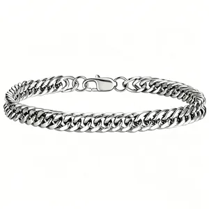 Detailed close-up of a polished silver Cuban link chain bracelet for men in hip-hop style