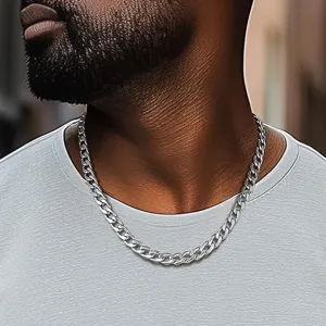 Close-up of a men's thick stainless steel Cuban link necklace in silver finish.
