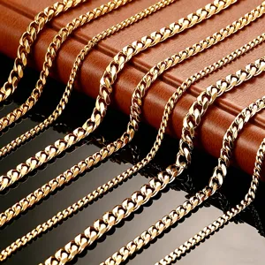Close-up of gold plated stainless steel Cuban link necklaces in various widths