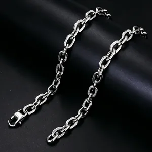 Close-up of polished stainless steel paperclip chain necklace with heavy links.