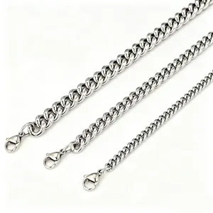 Three different widths of silver stainless steel Cuban link chains with lobster clasps.