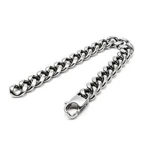 Macro view of chunky polished stainless steel Cuban link bracelet with lobster clasp