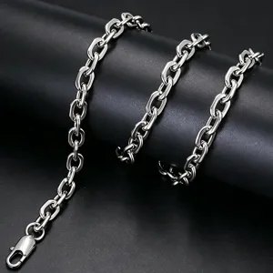 Macro view of polished stainless steel paperclip link chain with lobster clasp