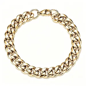 Detailed macro view of a high-polish gold plated stainless steel Cuban link chain necklace
