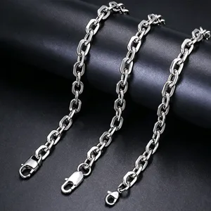 Macro detail of silver stainless steel paperclip link chain necklace with secure clasp