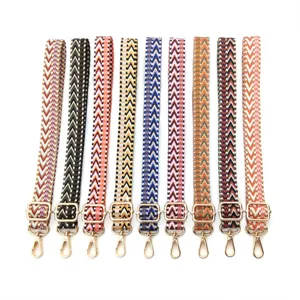Detailed macro view of multiple colorful patterned woven replacement shoulder straps
