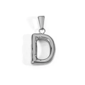 Detailed view of a silver stainless steel capital letter D pendant with polished finish