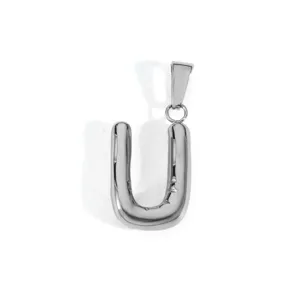 Detail of silver stainless steel puffy capital letter U pendant for DIY jewelry