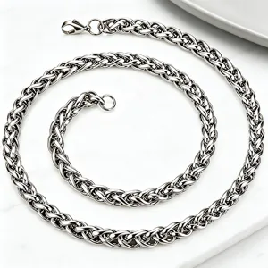 Detailed view of polished silver stainless steel wheat chain necklace with lobster clasp