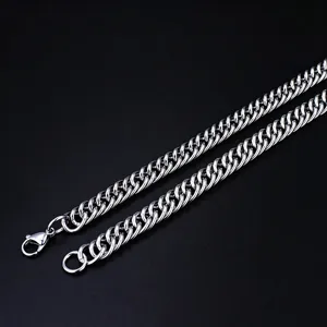 Close-up of thick stainless steel silver curb chain with lobster clasp for jewelry