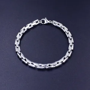 High-quality detail of polished stainless steel tank chain bracelet with bamboo link