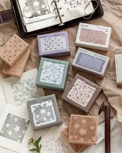 Detailed view of various beechwood stamps with nature-themed patterns for journaling
