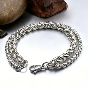 Detailed view of heavy silver stainless steel double-layer braided wheat chain bracelet for men