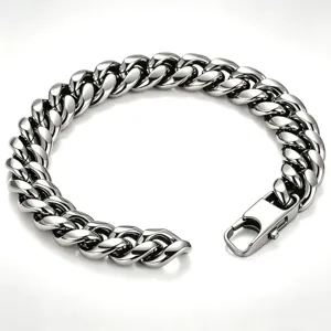 Detailed macro view of a polished stainless steel Cuban link bracelet for men.