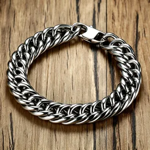 Close-up detail of a high-polished titanium steel Cuban link bracelet for men jewelry