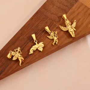 Detail view of four 18K gold-plated Cupid angel pendants on a wooden background