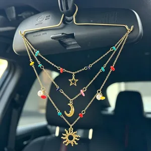 Celestial car hanging ornament with sun moon stars charms and colorful beads for rearview mirror.