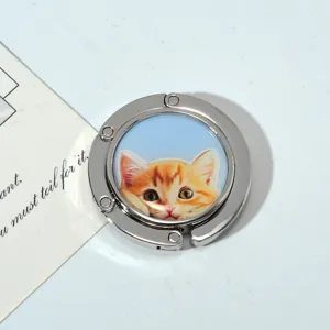 Portable foldable metal bag hook with a cute orange tabby cat pattern