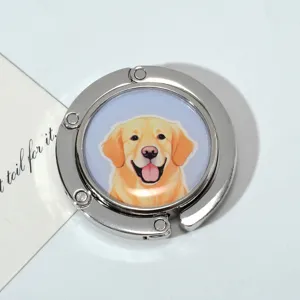 Portable foldable metal bag hook featuring a cute golden retriever dog illustration