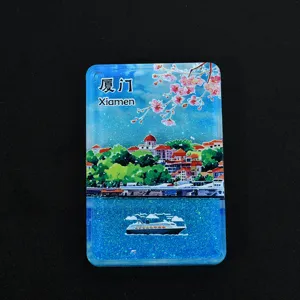 Vue détaillée d'un aimant de réfrigérateur Xiamen avec liquide pailleté bleu