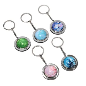 Tragbare Taschenhaken-Schlüsselanhänger mit Marmormuster und Metallringen, 5er-Set