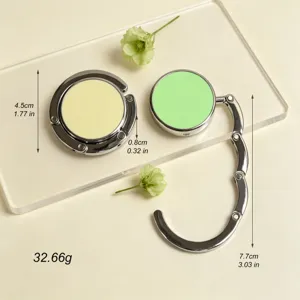 Detail view of portable folding handbag hook with dimensions 4.5cm and weight 32.66g