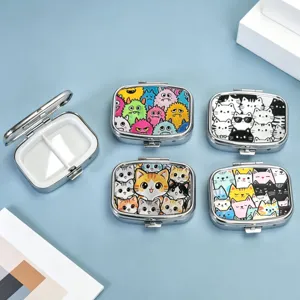 Compact metal pill boxes featuring two compartments and various colorful cartoon cat designs