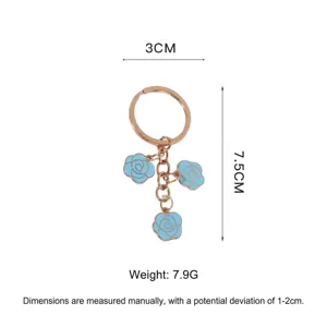 Detailed view of three blue enamel rose charms keychain with 7.5cm length measurement