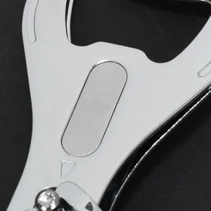 Macro detail of a durable 3-in-1 stainless steel nail clipper featuring bottle opener