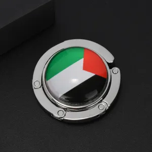 Portable foldable metal handbag hook featuring the Palestine flag for office table use