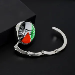 Portable foldable bag hook featuring Palestine flag design and Free Palestine text detail