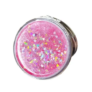 Portable round folding makeup mirror with pink quicksand glitter and heart sequins