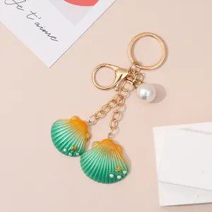 Unique creative resin seashell keychain with elegant pearl charms for bags and car keys