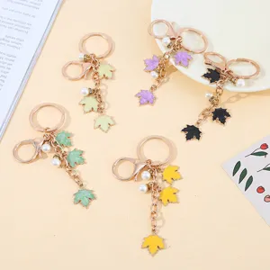 Multicolor maple leaf keychain pendants with pearls and gold metal rings