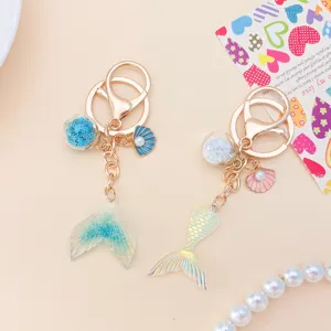 Elegant creative gradient mermaid tail keychains with sequin glass ball and shell charms
