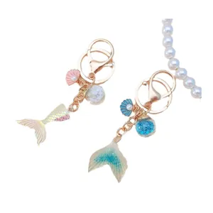Beautiful gradient mermaid tail keychains with star glitter balls and pearl shell charms