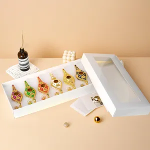 Set of 6 luxury Aladdin lamps with gold patterns in a white gift box for home decor.